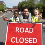 Active Travel Commissioner Dame Sarah Storey, marked Walk to School Week (16 – 20 May) with a visit to two Leigh primary schools