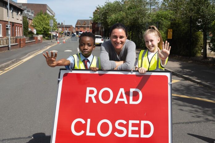 Active Travel Commissioner Dame Sarah Storey, marked Walk to School Week (16 – 20 May) with a visit to two Leigh primary schools