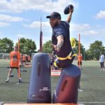 Local children from Manchester learned a whole new ball game as legendary NFL team Chicago Bears held an American Football masterclass