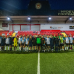 Greater Manchester Fire and Rescue Service firefighters and Grenfell Athletic battled it out on the football pitch to raise money for charity