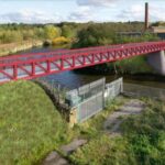A new bridge is to be built over the River Irwell to replace one destroyed by floods almost seven years ago