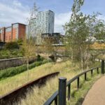 Manchester’s first new public park in more than century has officially opened transforming an area of the city